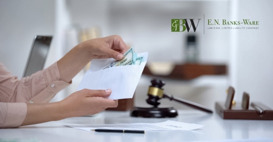 divorced woman holding envelope with dollars